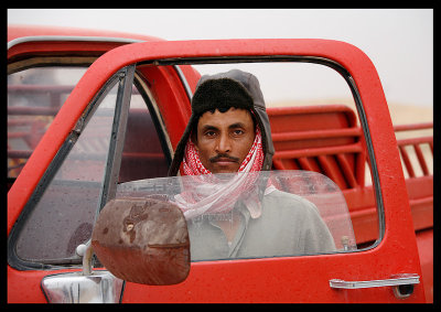 Dressed for winter driving in Kuwait desert!