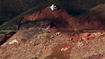 2016 - Air Force Thunderbird flying low over the ugly Colorado Springs rock quarry military aviation stock photo #4829CC