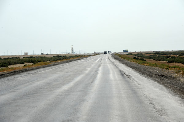 Heavy trucks have damaged the road surface leaving deep ruts