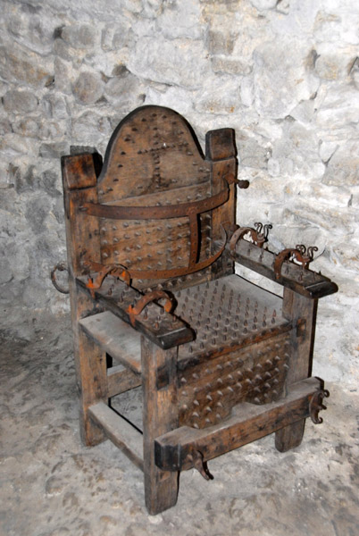 Inquisition chair, studded with spikes