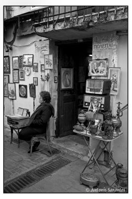10 Feb 2005 Woman in front of an old store