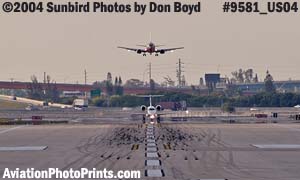 Delta Airlines (Chautauqua Airlines) EMB-135 and Southwest Airlines B737 go-around sequence #1 - aviation stock photo #9581